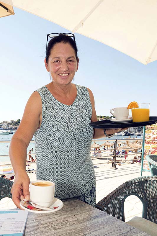 Claudia Kauf operates 'Claudia's Cafeteria' in Porto Cristo, Mallorca